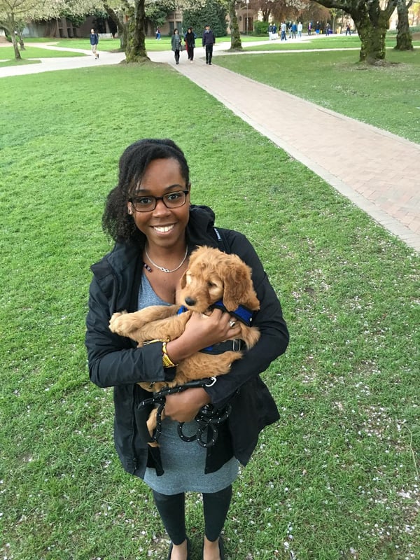 Photo of Kamilah Jenkins, Software Engineer at Textio with her puppy