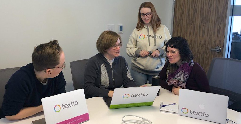 A group of Textio's beginning work on a new product feature