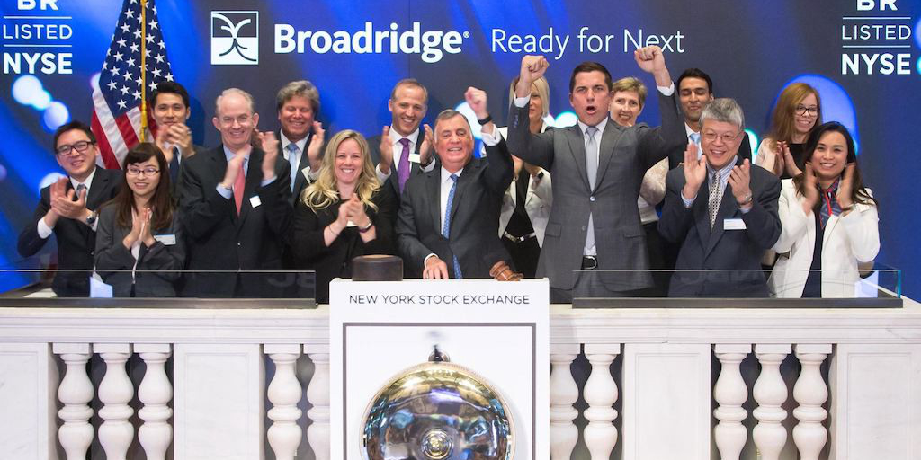 Broadridge associates celebrated the firm’s 10-year anniversary by ringing the opening bell at NYSE in June this year. (Photo from Broadridge.)